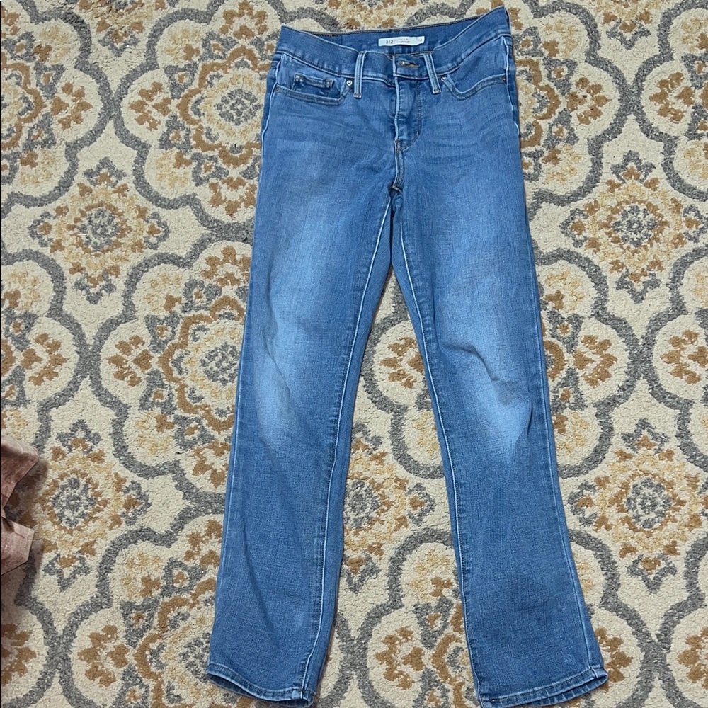 Levi’s 312 shaping slim blue jeans